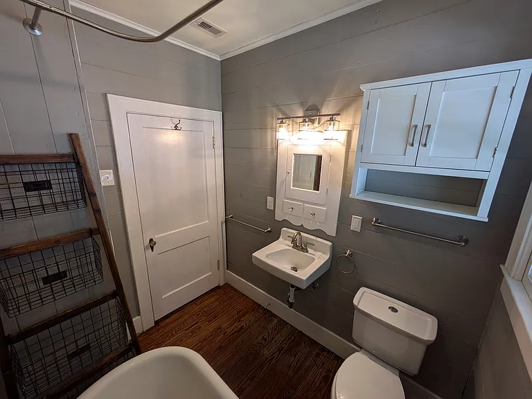 Bathroom has multiple GFI outlets on either side of the sink for hairdryers, etc.,. Perfect for left or right handers!