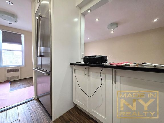 4th image of 6115 43rd Ave APT 3H