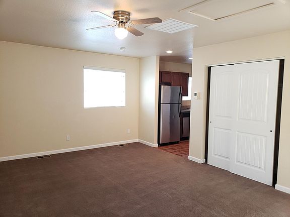 Main living/sleeping area of studio facing kitchen.