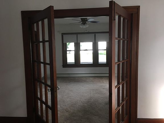 French doors separating dining from living area