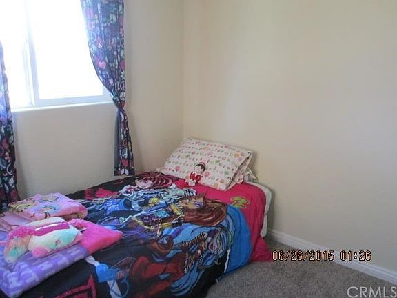 Bedroom 2 with carpet.