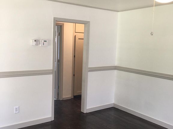 Living room into bedroom/bathroom hallway