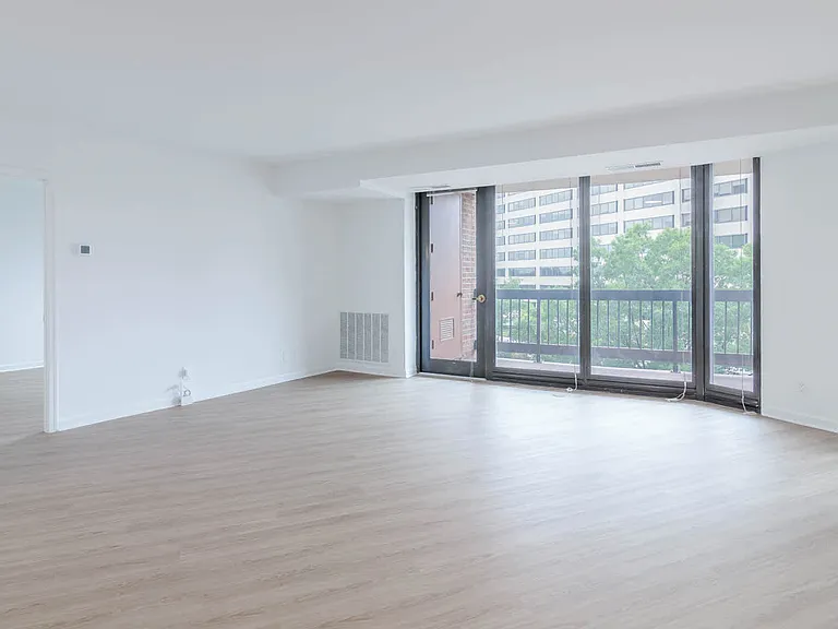 Living Room with Balcony and Hard Surface Flooring