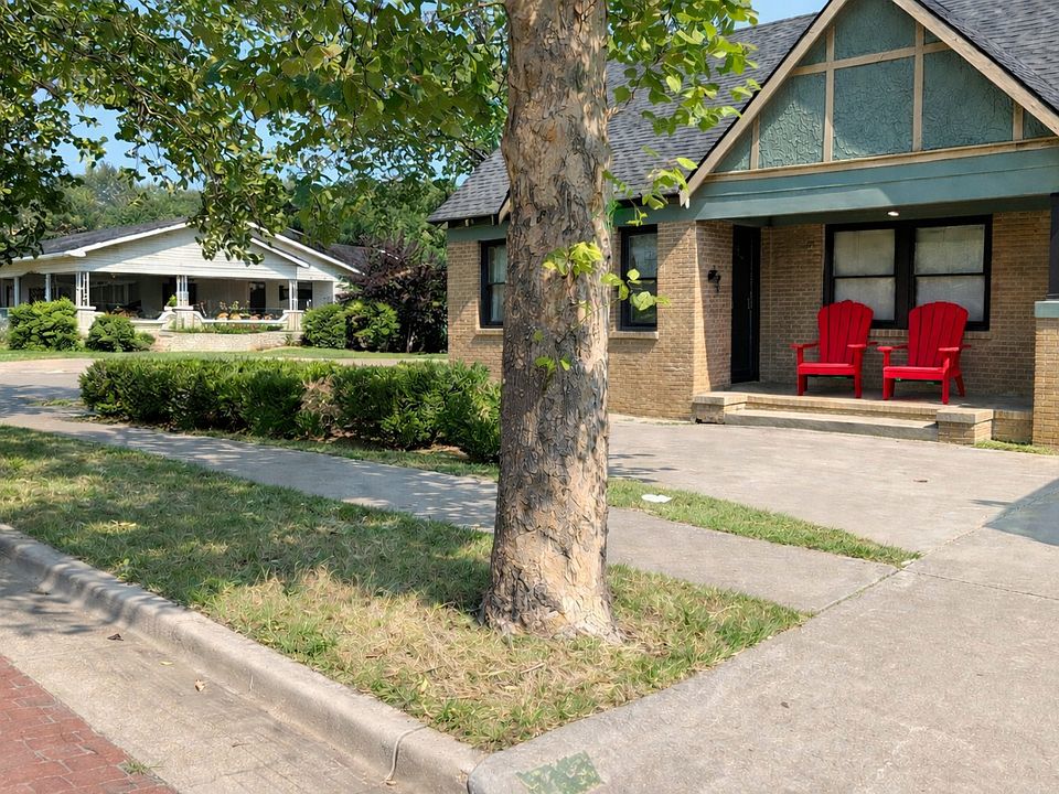 Great covered front porch and off street parking for 4 cars