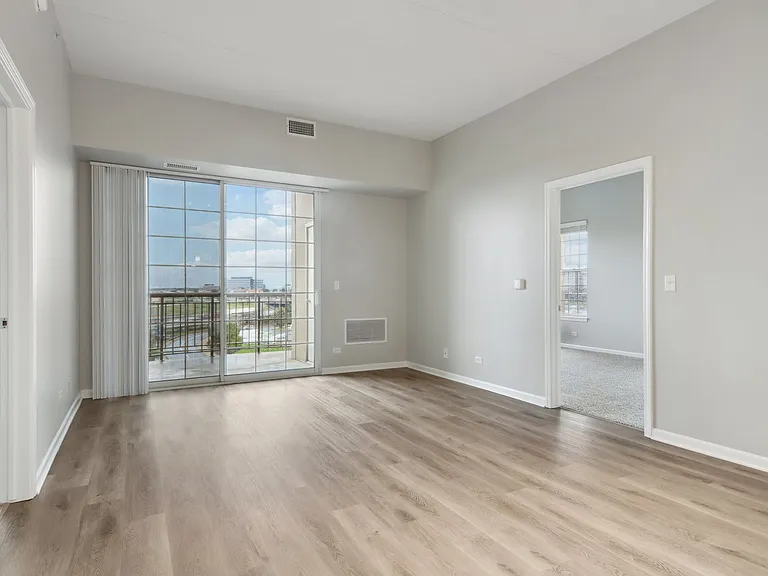 Bright bedroom with balcony access