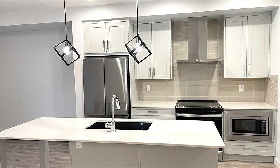1st image of 40 Sage Hill Walk NW #115