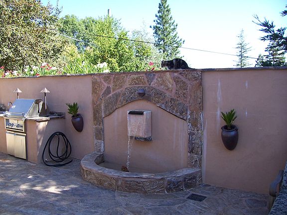 Side Patio With Fountain