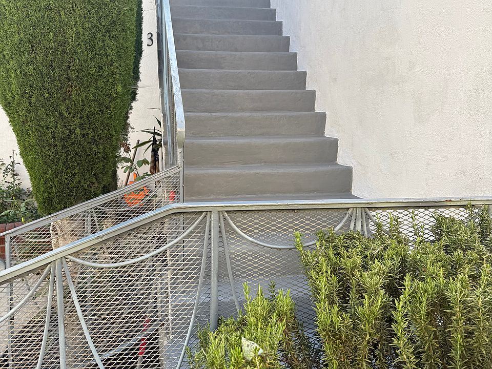 Exterior stairs to apartment on the right