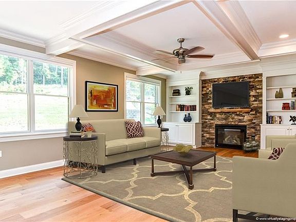 What a fabulous family room!  Opening directly from the gourmet kitchen, this spacious room boasts recessed lighting, a coffered