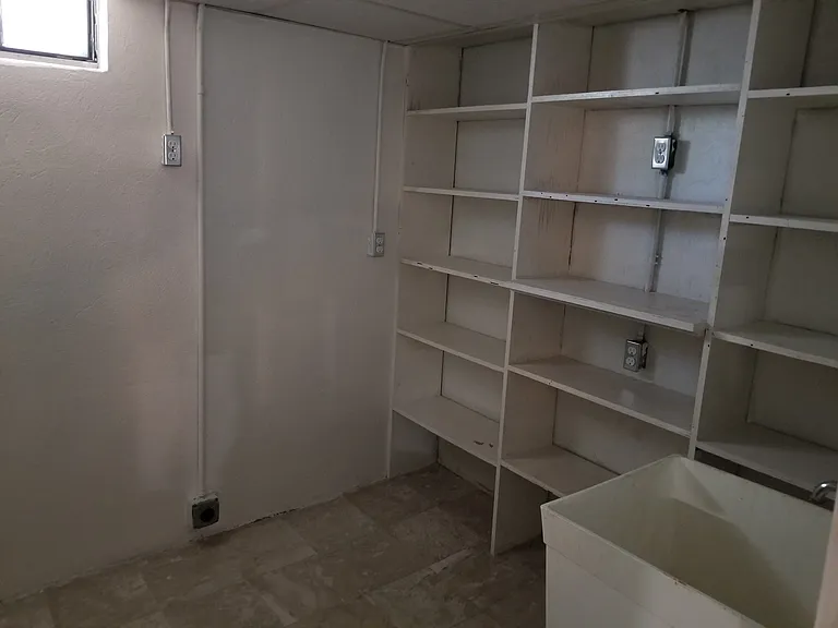 Storage Closet with Sink
Downstairs behind bar