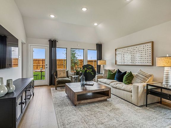 Living Room in the Turquoise home plan by Trophy Signature Homes - REPRESENTATIVE PHOTO
