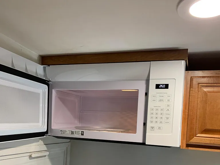 Brand new and large microwave