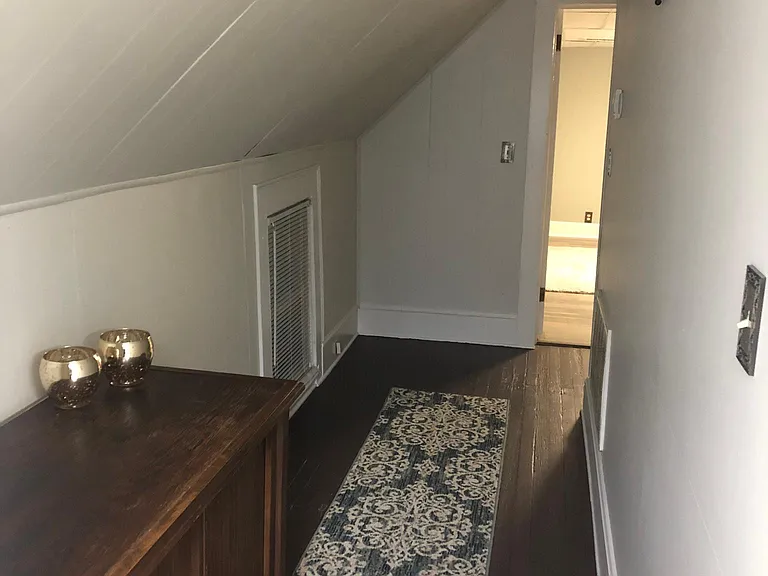 hallway leading from kitchen to livingroom.