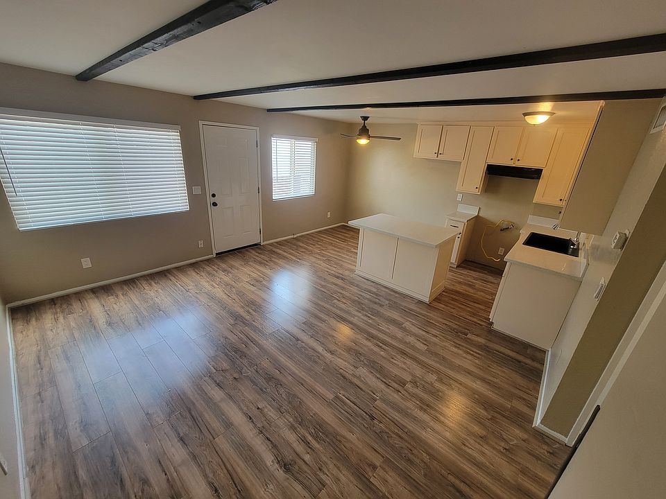 Living area, plenty of natural light.