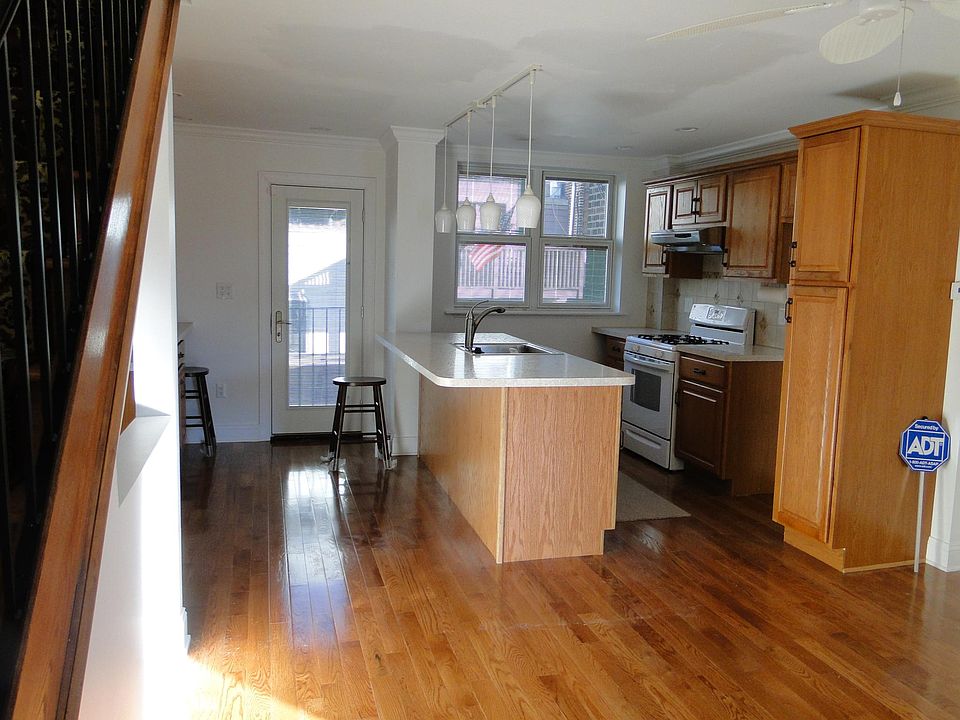 EAT IN KITCHEN LARGER COUNTER PLENTY OF CABINETS. DECK COMIN