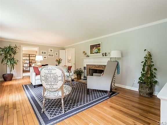 Formal living room with fireplace.