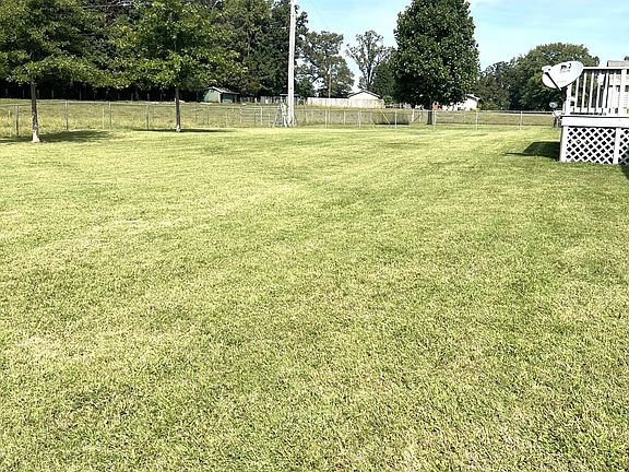 SPACIOUS FENCED IN BACKYARD