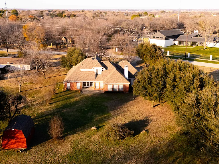 Plenty of backyard for entertaining guests and also pets or horses