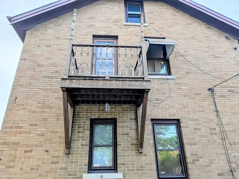 [UPPER UNIT]: second balcony. Faces backyard