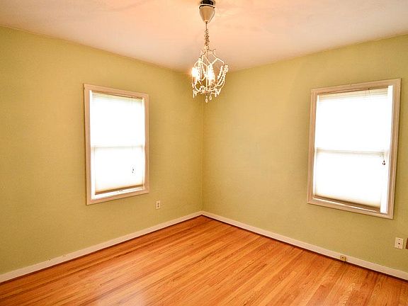 bedroom 1, has closet, looks to backyard
