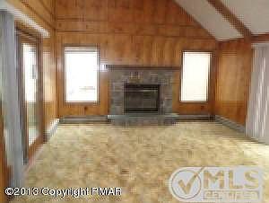 Living room w/Stone Fireplace