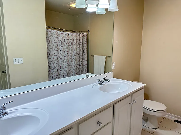 Shared bathroom with double vanity