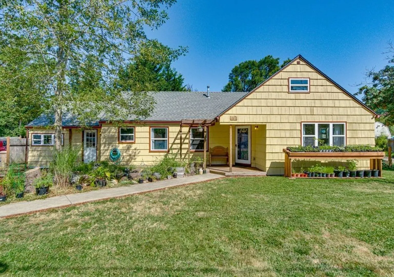 Soulful Milwaukie Farmhouse Solar Panels, Wood Stove, and Garden Retreat 3bed 1.5 bath — Photo 1