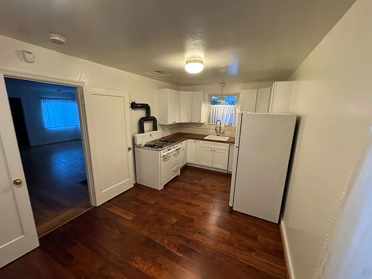 Kitchen with door to Living Room