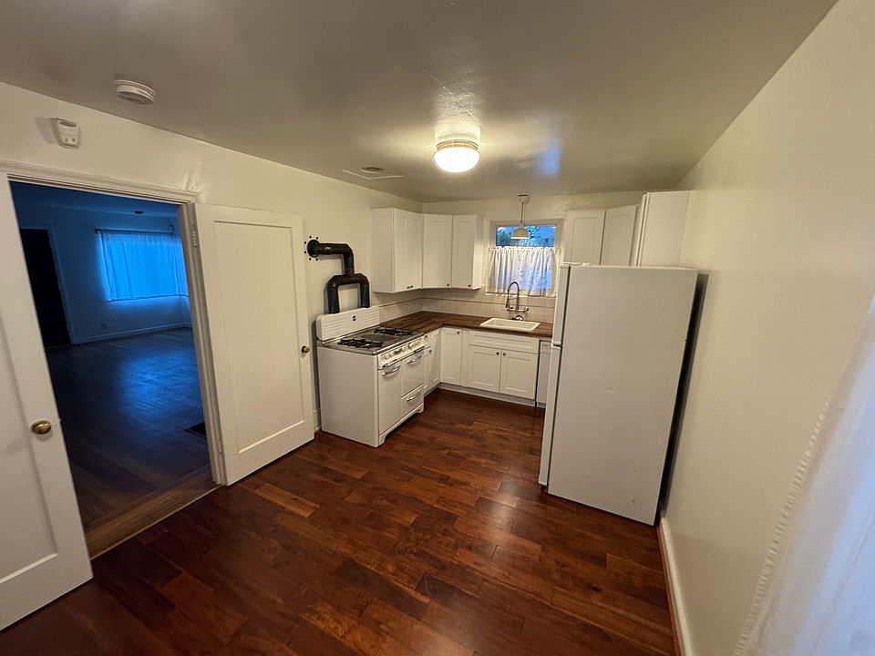 Kitchen with door to Living Room