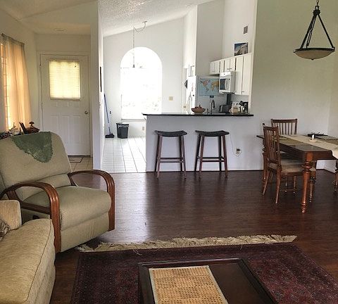 Dining room table seats four comfortably. Two leather-padded high chairs for optional dining. Remote controlled fan as supplement or substitute to AC. Both bedrooms are equipped with fans and central AC.