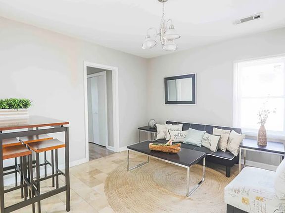 Off kitchen breakfast nook and seating area