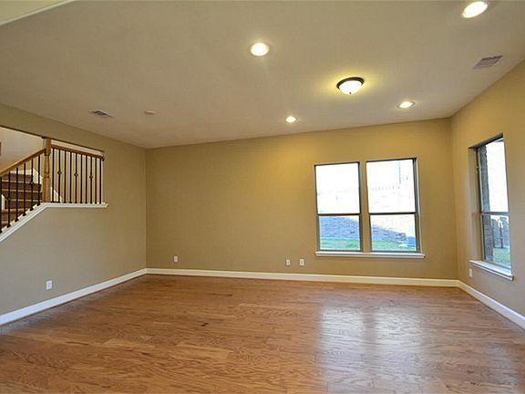 Elegant Large Formal Dining Room and Living Room combination with High Ceilings, Upgraded Hardwood Floors and more.