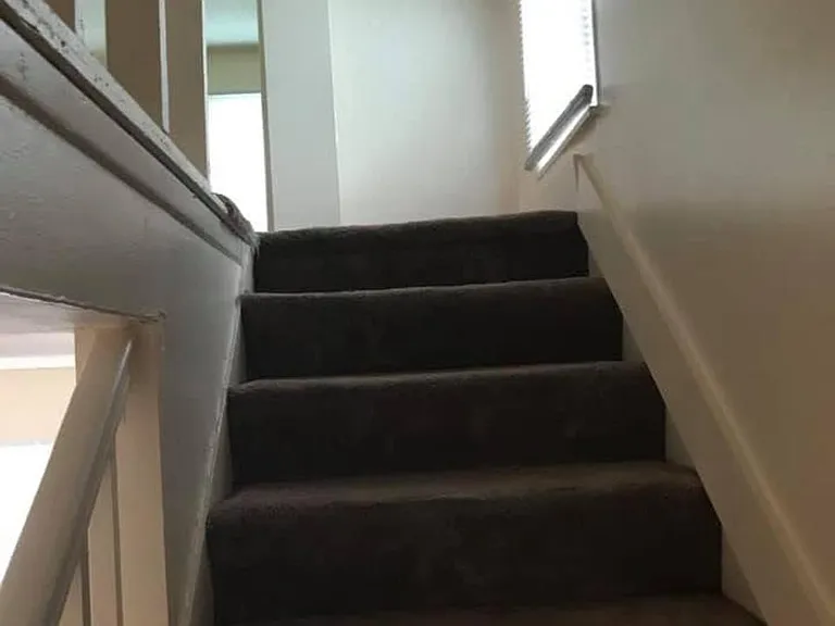 Stairway to 2 upper bedrooms.