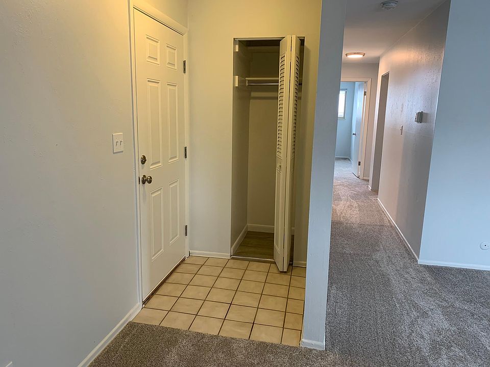 Front door entry. Tile on the floor. Coat closet.