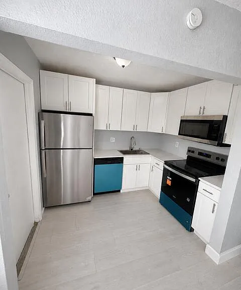4703 NW 9th Dr — Photo 3