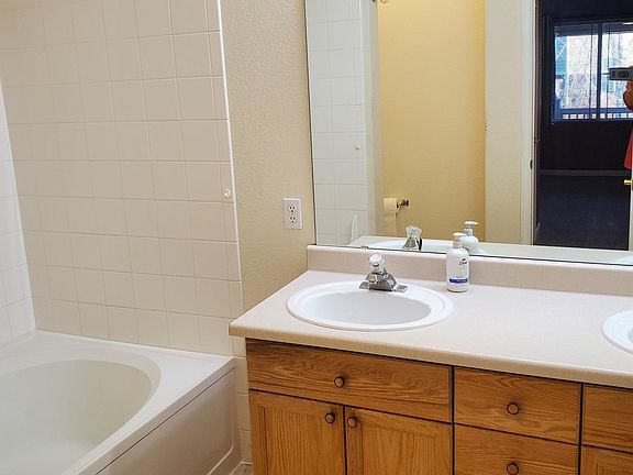 Master Bath with shower/tub, 2 sinks. 2nd bath has walk in shower, 1 sink.