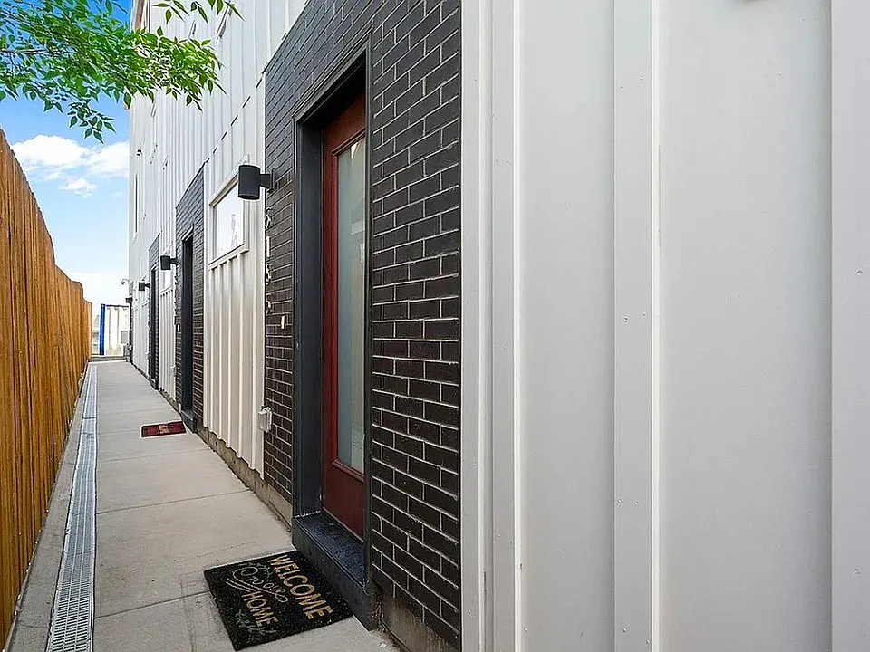Step into modern elegance with this stylish apartment entrance.