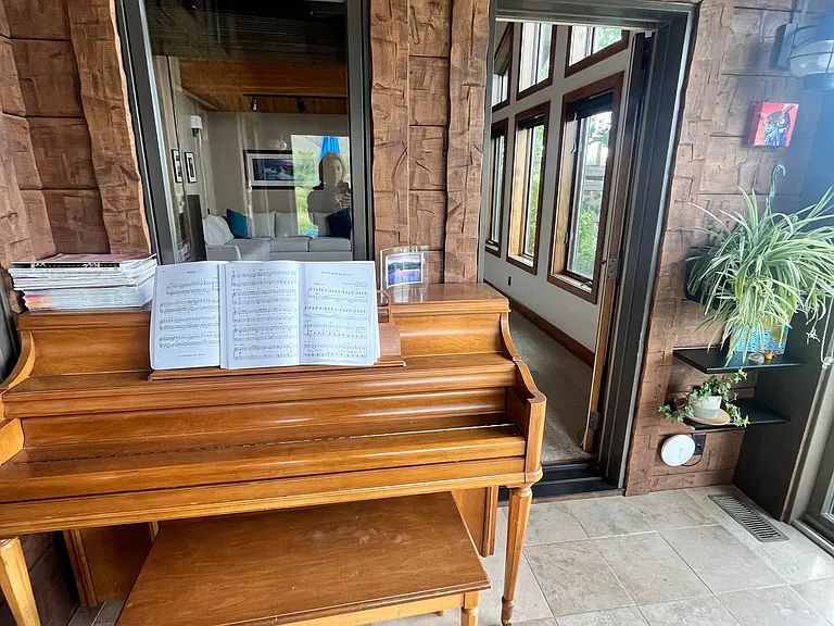 Sunporch with piano.