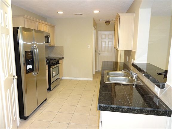 4th image of 10823 Windfern Lakes St
