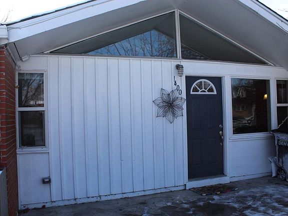 Front entrance with fence around front patio.