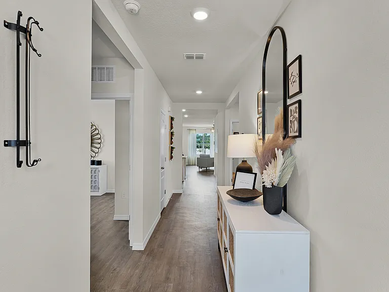 Bright and welcoming entryway with stylish modern touches.