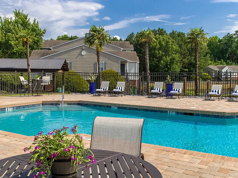 Enjoy a swim in our generously-sized resort-style pool, surrounded by serene lake views.