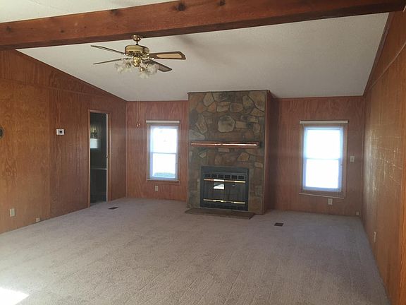 Spacious living room with new carpet