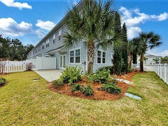 Extended back yard makes for one of the largest in the community.