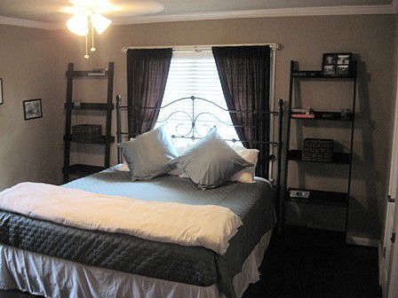 Generous sized master bedroom -- Light and bright with lots of windows. 