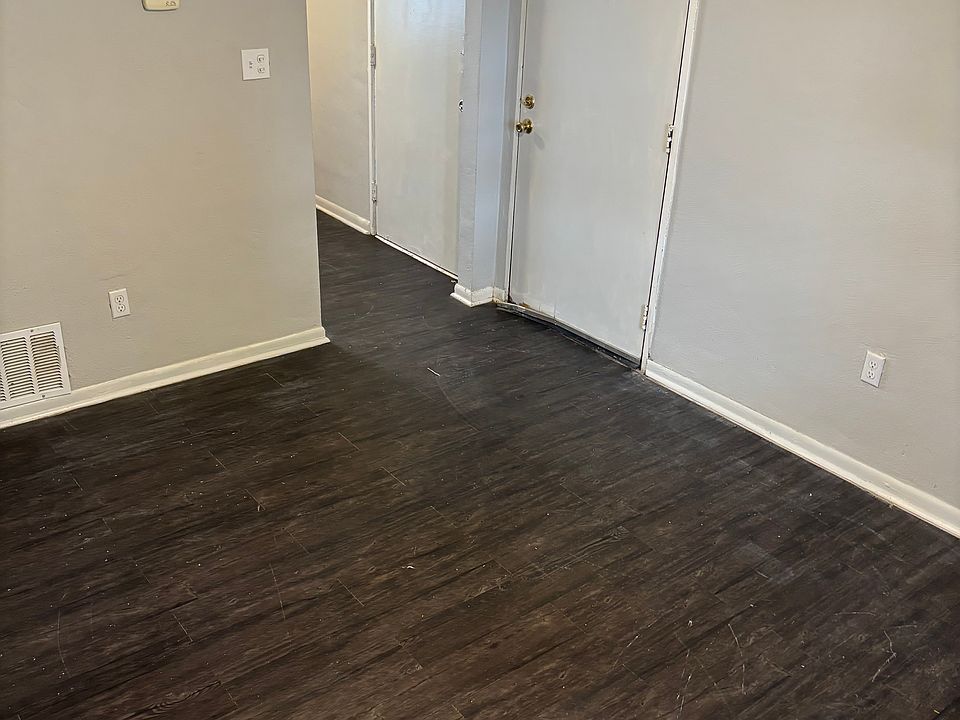 Living room leading to kitchen.