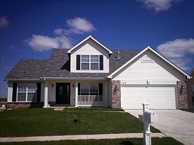 Premium lake lot with a lush sodded front yard