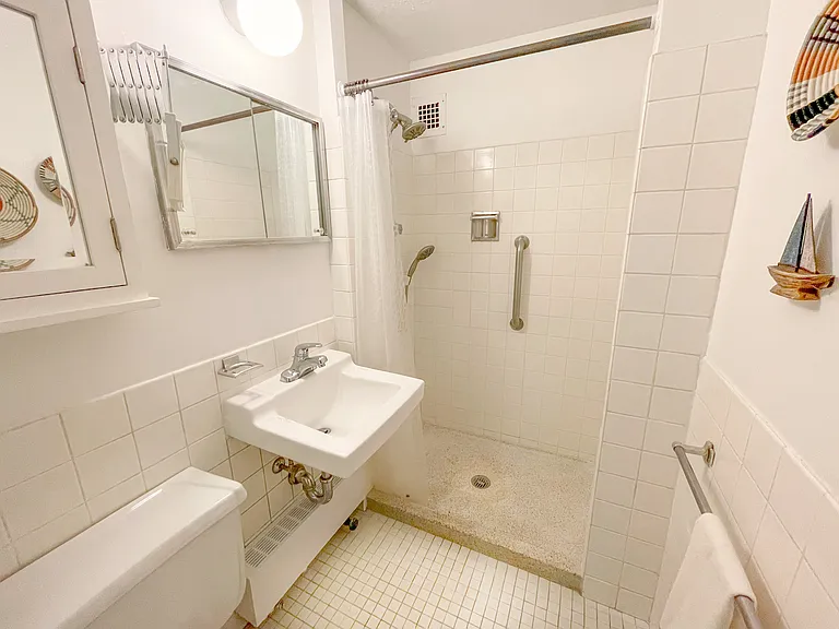 First bathroom off hallway from living room