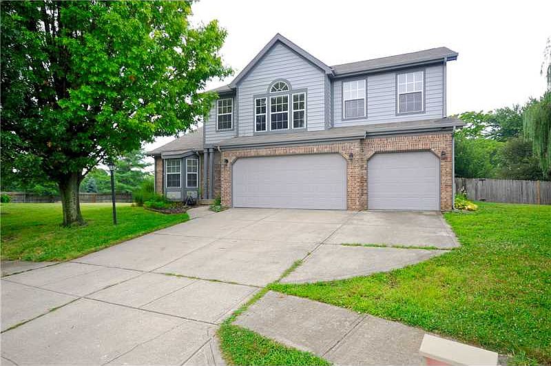 Brick front, 3 car garage