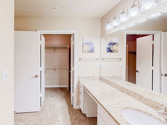 Spacious full private bathroom with tons of vanity space.